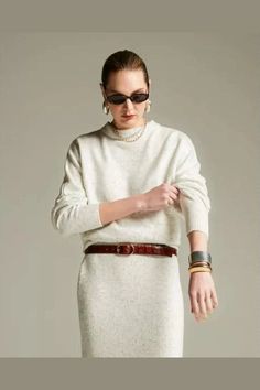 The Norway Sweater by Maria Pavan is a must-have for any wardrobe. Its timeless and modern design will add versatility to your style. Stay stylish and comfortable with this unique piece. Elegant Neutral Sweater For Fall, Modern Sweater For Everyday Fall Wear, Modern Everyday Sweater For Fall, Elegant Fall Sweater For Daywear, Versatile Beige Sweater For Work, Modern Beige Sweater For Workwear, Modern White Sweater For Fall, Elegant Winter Sweater For Everyday, Modern Beige Sweater For Work