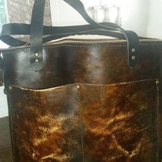 amy sharp added a photo of their purchase Vintage Brown Oiled Leather Bag, Vintage Bag With Leather Handles In Oiled Leather, Vintage Bag With Leather Handles And Oiled Leather, Vintage Distressed Brown Shoulder Bag With Leather Backing, Vintage Distressed Brown Bag With Waxed Finish, Distressed Brown Vintage Shoulder Bag With Leather Backing, Vintage Distressed Brown Bags With Waxed Finish, Vintage Leather-backed Tote Bag, Vintage Tote Bag With Leather Backing