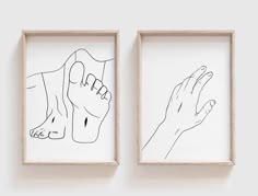 two framed drawings depicting hands and fingers