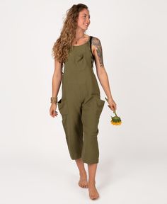 These Hemp Slouchy Overalls are perfect for your boho spirit! Made with a thin, drapey viscose fabric, you will dig the thin, adjustable shoulder ties and flowy cut. Features a relaxed, wide leg, crop-length bottoms, and three slouchy, large pockets (front kangaroo and two side cargos). Complete the look with a hippie Soul Flower cropped top or tank. Moss. Slouchy Overalls, Boho Hippie Outfits, High Neck Crop Top, Maxi Skirt Dress, Eco Friendly Clothing, Made Clothing, Halter Crop Top, Hippie Outfits, Front Tie Top