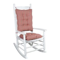 a white rocking chair with a red and white checkered seat cover on it's back