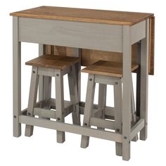 two stools sit on top of a wooden table