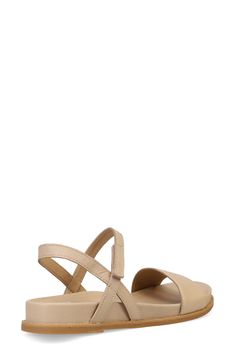 Elevate your warm-weather looks with this timeless open-toe sandal designed with a wide lower band and adjustable hook-and-loop ankle strap in soft leather. 1" heel; 1/2" platform (size 8.5) Leather upper and lining/synthetic sole Imported Beige Double Strap Sandals With Buckle Closure, Spring Sandals With Adjustable Single Toe Strap, Beige Leather Open Toe Slingback Sandals, Spring Open Toe Footbed Sandals With Heel Strap, Beige Sandals With Buckle Closure And Single Toe Strap, Sandals With Adjustable Strap And Round Toe, Beige Slingback Sandals With Leather Footbed, Beige Slingback Sandals With Heel Loop, Beige Open Toe Sandals With Removable Insole