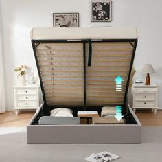 a bed with an open box underneath it