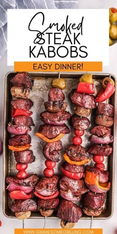 steak kabobs on a grill with peppers and onions in the background, text overlay reads grilled & steak kabobs easy dinner