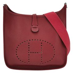 Hermes Evelyne 33 Large Crossbody Bag Burgundy with Strap These are professional photos of the actual bag offered by Luxbags. The Hermes Evelyne 33 Large Crossbody Bag offers a minimalist silhouette and lightweight design, providing freedom for both body and mind. Made without linings, it moves with you, making it the perfect choice for those on-the-go. Evelyne TPM was discontinued in 2019. Brand: Hermes Model: EvelyneSize: 33Dimensions: Width 33cm, Height 35cm, Depth 9.5cmWeight: 645gMaterial: Luxury Burgundy Shoulder Bag With Smooth Grain, Hermes Crossbody Bag, Luxury Burgundy Shoulder Bag With Branded Hardware, Luxury Burgundy Smooth Grain Shoulder Bag, Vintage Hermes Crossbody Bag, Chanel 19, Large Crossbody Bags, Jane Birkin, Professional Photo