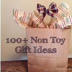 a paper bag with the words 100 + non - toy gift ideas on it