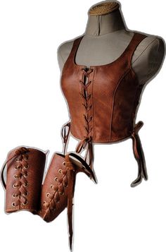 Medieval Style Fitted Leather Corset, Medieval Leather Fitted Corset, Fitted Leather Medieval Corset, Brown Corset For Cosplay, Medieval Style Corset For Larp, Medieval Style Brown Overbust Corset, Medieval Brown Overbust Corset, Vintage Brown Corset For Larp, Viking Armour