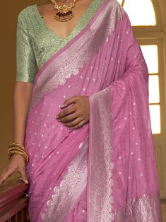 Celebrate your upcoming festivals, events, and any occasion with this beautifully designed astonishing pink weaving silk function wear saree with a blouse. This saree is perfect for adding an ethnic touch to your wardrobe and making you stand out in the crowd. The combination of the pink silk saree with weaving work and the pista green color silk blouse with weaving work creates a stunning and elegant look.
You can wear it to festivals, weddings, parties, or any special occasion and make a style Designer Pink Slub Silk Traditional Wear, Pink Cotton Silk Pre-draped Saree With Self Design, Navratri Pink Cotton Silk Traditional Wear, Pink Cotton Silk Traditional Wear For Navratri, Pink Cotton Silk Traditional Wear For Festive Season, Festive Pink Cotton Silk Traditional Wear, Bollywood Style Pink Cotton Silk Traditional Wear, Pink Pre-draped Saree With Unstitched Blouse For Festivals, Pink Cotton Silk Pre-draped Saree For Wedding