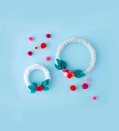 two hair accessories on a blue background