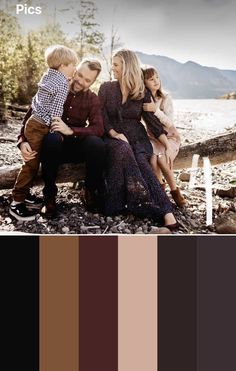 a family sitting on a bench in front of the water with their arms around each other