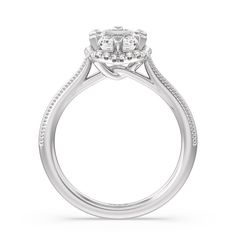 a white gold engagement ring with three stones