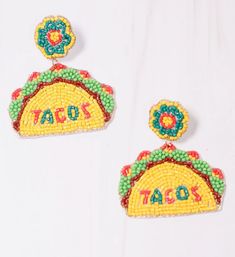 the taco earrings are decorated with beads