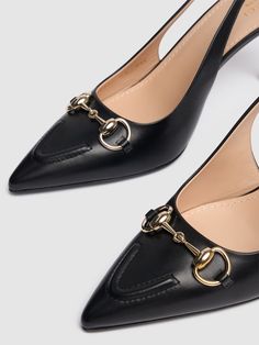 85mm Leather covered heel. Black leather upper. Slingback strap with elastic insert. Pointed toe. Horsebit detail. Light gold-toned hardware. Leather lining Gucci Pumps, Versace Brand, Gold Pumps, Pink Pumps, White Pumps, Gold Shoes, Pointed Toe Shoes, Heeled Loafers, Slingback Pump