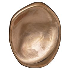 a large metal bowl on a white background