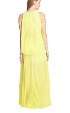 BCBGMAXAZRIA's maxi features an elegantly pleated skirt complete with a leg-baring front slit. Style with statement stilettos and a high-shine clutch for a party-perfect look. • Round neck, sleeveless, elasticized waist, pleated skirt • Front slit, back keyhole, lined, pullover style • Please note that this dress will be delivered with a black b-tag attached, with instructions for removal included. If the b-tag is removed, the dress cannot be returned. • Self/lining: polyester • Hand wash Chevron Outfit, Scalloped Lace Dress, Pleated Gown, Maxi Shirts, Skirt Maxi, Max Azria, Maxi Dress Online, Luxury Women Fashion, Bcbgmaxazria Dresses