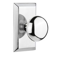 an image of a chrome door knob on a white background with black and silver accents