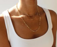 Your new go-to necklace! This solid paperclip chain necklace is handcrafted in 14k solid gold. Wear the necklace on its own or with other necklaces for that perfect layering look. - The chains comes in 14 - 20 inches. Made in 14k solid gold, white gold or rose gold- The chains are available is 3 different size- Available in 2x6mm, 3x10mm, or 4x14mm Weight of Gold:2mm 16" -  4g2mm 18" - 4.5g2mm 20" - 5g3mm 16" - 5.6g3mm 18" - 6.3g3mm 20" - 7g4mm 16" - 10.4g4mm 18" - 11.7g4mm 20" - 13g14k Solid go Paper Clip Gold Necklace, Gold Paper Clip Necklace, Gold Link Chain Necklace, Paper Clip Necklace, Gold Link Necklace, Gold Link Chain, Jewellery Inspiration, Gold Link, Classy Jewelry