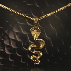 This is a Cobra necklace, a handmade jewelry. This unisex necklace is the perfect gift for him and her any time of the year  Immerse yourself in the mystical world and discover your inner power with our handmade cobra pendant necklace. Inspired by the sacred serpent, this handmade pendant invites you to explore spirituality and awaken your inner strength. The cobra symbolizes transformation, rebirth, and ancient wisdom. Its presence evokes the energy of kundalini, a powerful life force that lies Cobra Necklace, Necklace Snake, Inner Power, Bronze Necklace, Mystical World, Snake Necklace, Unisex Necklace, Life Force, Perfect Gift For Him