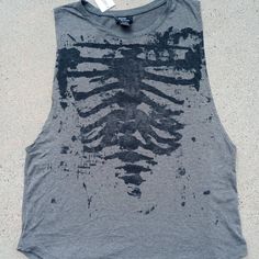 New Old Stock Hot Topic Tank In Gray. Rib Cage Graphic In A Black Burnout Print. Size Large. Light And Stretchy Poly-Rayon Blend. New With Tags. Summer Tank Top With Skull Print, Gray Distressed Tops For Summer, Summer Gray Distressed Tops, Edgy Gray Summer Tops, Edgy Gray Tops For Summer, Rib Cage Shirt, Blues Dance, Dance Tops, Muscle Shirts