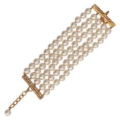 Chanel (Made in France) Wide bracelet made of fancy pearls. 2cc3 collection. Additional information: Dimensions: Length: 16.5 - 21 cm (6.5"-8.27") Condition: Very good condition Seller Ref number: BRAB154 Formal Pearl Beaded Bracelets With Pearl Chain, Formal Pearl Beaded Bracelets, Formal Pearl Beaded Bracelet, Formal Beaded Pearl Bracelet, Party Pearl White Beaded Bracelets With Pearl Chain, Party Pearl White Beaded Bracelets, Formal Beaded Bracelets With Pearl Chain, Party Pearl Bracelet With Gold Round Beads, Party Pearl Bracelet With Gold Beads