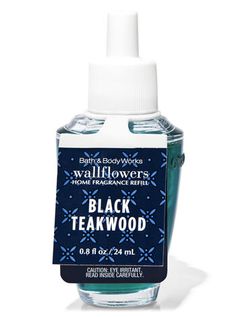 a bottle of black teakwood water on a white background