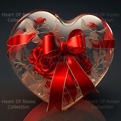 a heart shaped box with red ribbon and roses