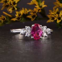 "Simple & dainty womens sterling silver ruby ring, Unique ruby promise ring for her, Womens art deco ruby silver ring, Ruby engagement ring WE OFFER UNLIMITED PERIOD INSTALLMENTS PLAN This is a beautiful, stunning, feminine ring that works well for all occasions, styles, and ages. You will love it! Ring information Main stone: White cubic zirconia Approximate size: 6x4mm Accent stones: White cubic zirconia Approximate size: 2.0mm (6 stones) Metal type: Silver Metal stamp: 925 Sterling SIlver Pink Lab-created Ruby Promise Ring, Anniversary Ruby Ring With Diamond Accents, Classic Ruby Ring With Cubic Zirconia For Promise, Dazzling Ruby Ring With Accent Stones For Promise, Classic Cubic Zirconia Ruby Promise Ring, Silver Ruby Ring With Diamond Accents For Weddings, Elegant Jewelry With Lab-created Ruby For Promise, Elegant Lab-created Ruby Jewelry For Promise, Classic Ruby Ring In Cubic Zirconia For Promise