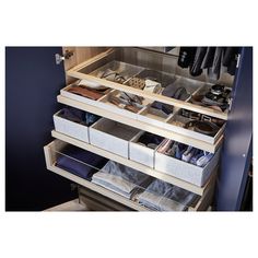 an organized closet with drawers and shoes