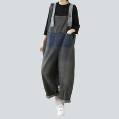 Introducing the 2023 Spring-Summer Collection's dark grey women's denim jumpsuit ââ‚?the perfect blend of contemporary fashion and nostalgic grunge! Crafted with premium quality denim. this fashion-forward piece features an edgy. distressed pattern with a sleek slim fit. Plus. a resilient zipper and stylish button closure ensure both function and style.Distinctive Features: Patchwork Design: An expertly crafted distressed pattern to capture a raw. unfiltered essence. Baggy Fit: Textured to hug y Casual Washed Black Overalls For Spring, Dark Wash Cotton Non-stretch Jumpsuits And Rompers, Black Cotton Overalls Jeans, Dark Wash Cotton Overalls, Trendy Black Denim Jumpsuits And Rompers, Black Cotton Overalls, Black Cotton Denim Jumpsuit For Spring, Gray Cotton Jumpsuits And Rompers For Summer, Gray Cotton Summer Jumpsuits And Rompers