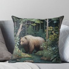 a brown bear in the woods with trees and leaves on it's back throw pillow