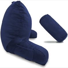 two blue pillows sitting on top of each other