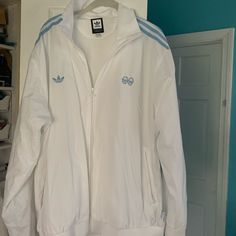 Adidas Full Zip Windbreaker Never Worn In Size Xl White Sporty Tops With Pockets, Adidas White Athleisure Track Jacket, White Adidas Windbreaker For Spring, White Sports Tops With Pockets, Adidas White Windbreaker For Sports, Adidas White Track Jacket For Fall, Adidas White Outerwear For Spring, Adidas Casual White Track Jacket, White Adidas Outerwear For Spring