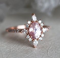 Vintage Pink Sapphire Engagement Ring Rose Gold Oval Peach | Etsy Heirloom Pink Sapphire Wedding Ring, Heirloom Style Pink Sapphire Wedding Ring, Pink Sapphire Wedding Ring With Rose Cut Diamonds, Pink Sapphire Ring With Rose Cut Diamonds For Wedding, Exquisite Pink Diamond Ring With Rose Cut, Wedding Pink Sapphire Ring With Rose Cut Diamonds, Classic Pink Sapphire Wedding Ring, Classic Pink Sapphire Ring For Wedding, Heirloom Pink Rings With Diamond Accents