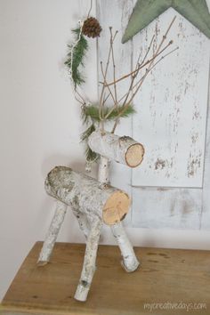 an image of a deer made out of wood