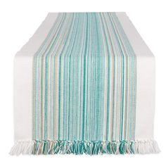 a table runner with tassels on the edge and fringed edges in aqua blue