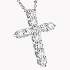 A precious interpretation of a classic motif, our small cross pendant in white gold is available in a variety of different carat weights, seen here with 0.10 carat diamonds. Deftly suspended from a white gold chain, each diamond is embraced by a minimal metal setting, optimising their brilliance and presence. The Classic Graff collection celebrates the purity and fire of the finest Graff diamonds showcased in truly timeless jewels and eternally elegant silhouettes. A precious interpretation of a Graff Jewelry, Graff Diamonds, Round Diamond Pendant, White Gold Chain, Platinum Jewelry, White Gold Chains, Diamond Cross, Platinum Ring, Best Diamond