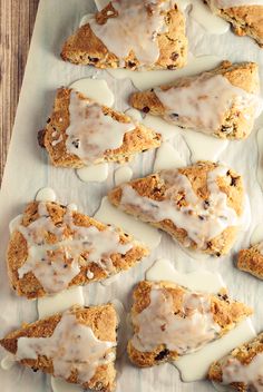 scones covered in icing and drizzled with white chocolate