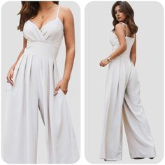 Crafted For The Modern Woman Who Appreciates Timeless Elegance With A Contemporary Twist, Our White Spaghetti Strap Wide Leg Jumpsuit Is A Wardrobe Essential That Promises Versatility, Comfort, And Undeniable Style. Ships Within 5 To 10 Days Material: 100% Polyester Measurements: S:Bust 35.43 In, Waist 27.56 In, Top Length 51.89 In, Hip 50.39 In, Inseam 28.82 In M:Bust 37.80 In, Waist 29.92 In, Top Length 52.36 In, Hip 52.76 In, Inseam 28.94 In L:Bust 40.16 In, Waist 32.28 In, Top Length 52.83 I Elegant Jumpsuits And Rompers With Spaghetti Straps, Elegant Spaghetti Strap Jumpsuits And Rompers For Spring, Elegant Solid Jumpsuits With Spaghetti Straps, Fitted Jumpsuits And Rompers With Spaghetti Straps For Spring, Fitted Spaghetti Strap Jumpsuits And Rompers For Spring, White Fitted Jumpsuits And Rompers With Spaghetti Straps, Elegant Summer Overalls Bottoms, Fitted Spaghetti Strap Jumpsuits For Spring, White Fitted Jumpsuit With Spaghetti Straps