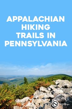 the words appalachian hiking trails in pennsylvania against a blue sky and rocky terrain