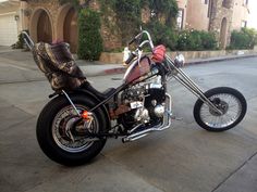 a motorcycle parked in front of a house