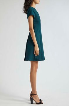 Crisp box pleats create a full-skirted silhouette in this elegant short-sleeve dress boasting shape-retaining stretch. Hidden side-zip closure V-neck Short sleeves 74% polyester, 19% viscose, 7% elastane Dry clean Imported Short Sleeve Midi Dress With Pleated Back For Work, Green Short Sleeve Semi-formal Dress, Formal Short Sleeve Stretch Mini Dress, Formal Stretch Mini Dress With Short Sleeves, Fitted Office Dress With Pleated Hem, Formal Stretch Dress With Pleated Back, Casual Pleated Dress With Pleated Bodice, Fitted Pleated Dress With Box Pleat For Workwear, A-line Mini Dress For Work