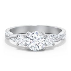 three stone diamond engagement ring in 18k white gold with side stones on the band