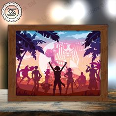 a wooden frame with an image of people dancing in front of a sunset and palm trees