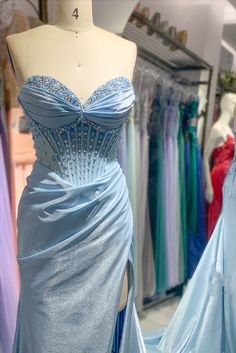 Blue Satin Corset Dress With Sweetheart Neckline, Embellished Fitted Corset Dress For Debutante Ball, Fitted Evening Dress With Corset Back For Pageants, Fitted Blue Corset Dress For Prom, Blue Fitted Satin Corset Dress, Fitted Blue Satin Corset Dress, Blue Fitted Corset Dress For Prom, Embellished Sweetheart Neckline Fitted Corset, Blue Fitted Evening Dress With Boned Bodice