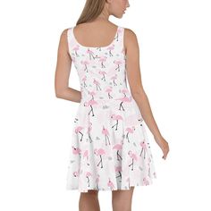 Perfect dress for a flamingo pool or beach party. Dress to impress with this sleeveless skater dress! The soft fabric and flared skirt give it an elegant twist that brings out the intricate design with a beautiful vibrancy. * 82% polyester, 18% spandex * Smooth and elastic fabric * Mid-thigh length flared skirt * Elastic waistline * Overlock seams, coverstitch hemline Pink Sleeveless Dress For Beach Vacation, Pink Sleeveless Dress For Beach Season Vacation, Casual Pink Sleeveless Beach Dress, Pink Sleeveless Dress For Beach Season, Casual Pink Sleeveless Dress For Beach Season, Pink Sleeveless Dress For Beach Party, A-line Fit And Flare Mini Dress For Beach, Summer A-line Sleeveless Dress For Beach Season, Pink Casual Mini Dress For Beach Party