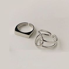 Minimalist Silver Finger Ring Adjustable Minimalist Metal Midi Rings, Minimalist Open Metal Stackable Rings, Minimalist Couple Rings With Open Design, Adjustable Modern Midi Rings With Simple Design, Minimalist Open Couple Rings With Simple Design, Minimalist Metal Rings With Simple Design, Minimalist Metal Stackable Rings, Minimalist Metal Midi Rings, Silver Finger Ring