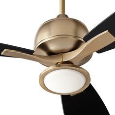 a gold ceiling fan with black blades and a white light on the blade is shown