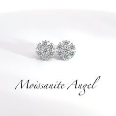 Vvs1 quality moissanite set in cluster style giving these earrings a tremendous amount of shine. Precious metal used to craft these earrings is 925 silver that will never fade. Size of these stunning studs are 10mm which will definitely get you many compliments. Studs are in hand ready to ship for fast delivery :) Sparkling Diamond Cluster Earrings For Anniversary, Anniversary Cluster Earrings With Prong Setting, Anniversary Cubic Zirconia Cluster Earrings, Cluster Earrings With Halo Design In Cubic Zirconia, Silver Moissanite Cluster Earrings, Cubic Zirconia Cluster Earrings With Halo Design, Dazzling Cluster Earrings With Halo Setting, Wedding Cluster Earrings With Prong Set Moissanite, Wedding Moissanite Cluster Earrings With Prong Setting