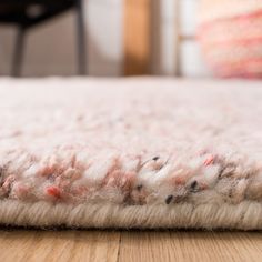 a close up view of a rug on the floor